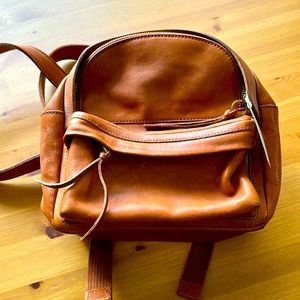 The Lorimer mini backpack, tan color.